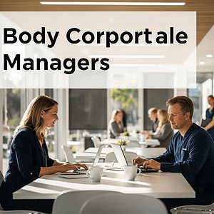 Professional body corporate managers conducting a meeting in a modern office, showcasing teamwork and leadership in property management services.